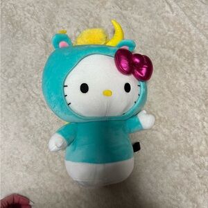 Cute Plush Toy with Teal and Pink Accents